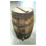 Water barrel with drain and lid. Steel bands in