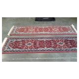 Two hallway runner rugs. Matching pattern, one
