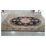 Area rug, center medallion. Black and beige