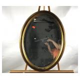 Oval wall mirror, beveled edge, light wear to