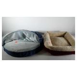 Pet beds, both used, but still usable