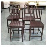 Four brown bar stools with backs. 24" seat