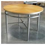 Round dining table with brushed nickle base. 44"