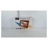 9 inch digital photo frame, new in box.