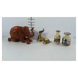 Wooden elephant figure, brass elephant bell and