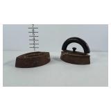 2 cast iron flat irons. One with handle and one