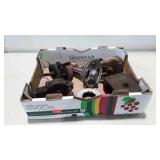 Assorted pulleys and hand crank grinders