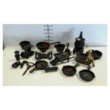Mostly cast iron miniatures. Ashtrays, stove,