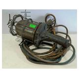 Industrial drop light. Some tape repairs on cord.