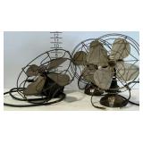 Three vintage desk fans.