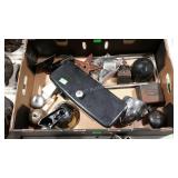 Flat of industrial parts and pieces. Bells, glove