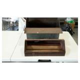 Toolbox with chipped green paint. Rusty, with