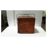 Antique cooler. Graphics are no longer legible.