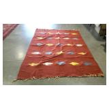 Woven area rug with bird pattern. 57"×88".