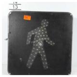 Walking street sign. Wired, but needs a plug.