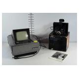 Panasonic 4 inch TV console. Powers on. Also a