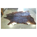 Hide rug. Approximately 70"×80".