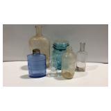 Glass bottles and a ball jar