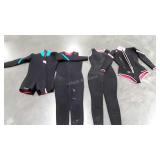 Four diving suits, two full and two short, all