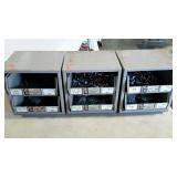 Three parts bins with assorted nuts and bolts.