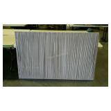 Board covered with pleated material and e