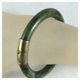 Gold tone and jade like bangle