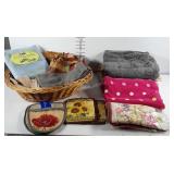 Linens. Bathroom towels, floral pot holders,