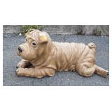 Painted concrete dog statue