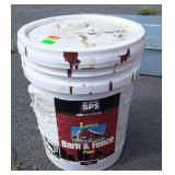 Barn and fence paint "red", almost full bucket