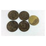 Five brass brothel tokens