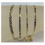 Four gold tone bracelets