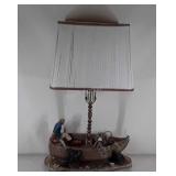 Nautical themed table lamp, fisherman in rowboat.