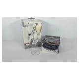 Glassware, set of four crystal flutes and a