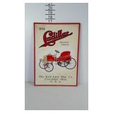 Cadillac metal sign with 1914 Cadillac pictured.