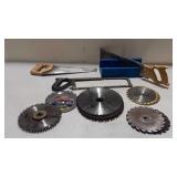 Saws lot. Three hand saws, one mitre box, and