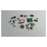 Group of Christmas jewelry.  Broaches, bracelet