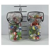 2 small jars of marbles.