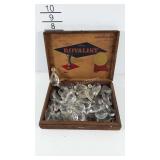 Wooden cigar box of prisms.