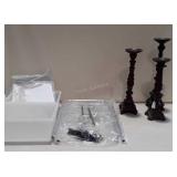 Three decorative resin candleholders, and