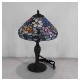 Table lamp with leaded glass shade, finial is
