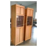 Two lighted tower style entertainment center