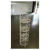 Ironworks curio shelf. 59" high.