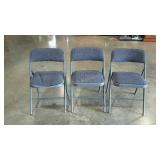 Three folding chairs. Two have damage but still
