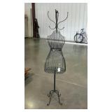 Coat rack in dress firm style. 69" high.