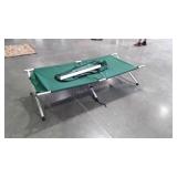 Folding camping cot with carrying bag.