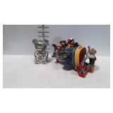 Two teddy bear banks. One metal mother and baby,