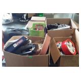 Skid lot of linen, Titleist towel, cookie tins,