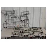 Two wall mount, votive candle holders. 48"×34",