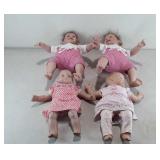 Four baby dolls, two soft body baby dolls with