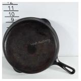 9 inch cast iron skillet marked Erie, PA.
